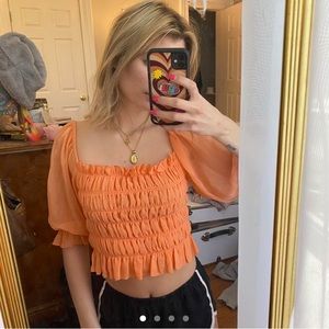 Urban Outfitters coral / orange smocked peasant blouse